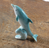 Delphin auf der Welle, Porzellanminiatur,Miniatur